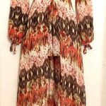 Luxxel NWOT  sheer romper with maxi overlay. Sz S Photo 1