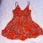 Skylar + Madison Orange floral romper Photo 0