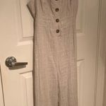 Romeo + Juliet Couture Striped Jumpsuit Photo 0