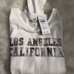 Hollister NWT. XS.  Long-Sleeve Print Graphic Baby Tee Photo 3