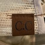 Charming Charlie ’s Criss Cross Leopard Ponytail Trucker Hat Photo 10