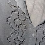 YA Los Angeles  sheer sleeveless button front top.​ Photo 1