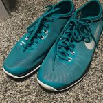 Nike  teal blue 6.5 running shoes Photo 5