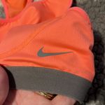 Nike  Women’s Melon DriFit Sports Bra Size Small Photo 1