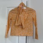 Love, Fire NWT  cropped cardigan and tank set in orange sherbet with ditsy print. Photo 5
