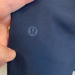 Lululemon On The Fly Pant *Woven Track Stripe in True Navy and Black Photo 7