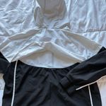 Nike  Womens Size Large Windbreaker Sportswear Windrunner Black White Hooded Photo 8
