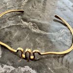 Gold Minimalist Open Cuff Bracelet with Central Accent Photo 0