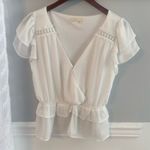 Francesca’s boutique white ruffle‎ short sleeve top Photo 0