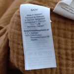 Madewell Lightspun Button-Back Peplum Top in Mustard Photo 9