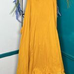 Gold wrap, maxi skirt, beautiful tassel tie, and trim on bottom Size undefined Photo 3