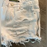 None Women Zipper Side Denim Ripped distressed white Shorts with star design pocket Photo 5