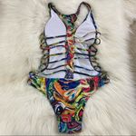 Abstract Plunging Strappy Cheeky Colorful Cutout Bathing Suit Photo 4