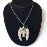 Silver Toned Cross With Wings And Crown Necklace Photo 1