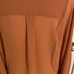 Double Zero | Light caramel V-neck long split sleeve blouse.  Longer, sheer back. Photo 7