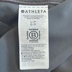 Athleta Salutation Stash Wrap Tight leggings cutouts pockets Hematite Grey Sz LP Photo 12