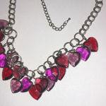Silver Tone Heart Charm Statement Necklace with Red and Pink Accents Photo 2