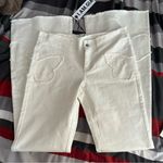 I am gia I.AM.GIA White Butterfly Flare Jeans Photo 0