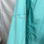 Under Armour  women's turquoise heat gear‎ long sleeve active button zip shirt M Photo 2