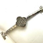 Silver tone clover bangle bracelet Photo 5