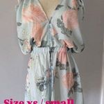 Summer light blue beach romper with floral print size xs Photo 1
