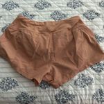 Nike Tan  running shorts Photo 1