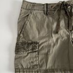 Women's Olive Cargo Shorts. Drawstring with button and zipper. Inseam 4” Size 4 Green Photo 2