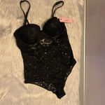 Jezebel 🆕  Black Lace One Piece Photo 1