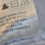 by the way. Carrie Button Up Blouse Light Blue size small Photo 11