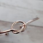 Very Light Shade of Rose Gold Tone Knot Bracelet Photo 2