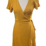 Lulus Lulu’s mustard yellow true wrap dress split flutter sleeve size medium dress. Photo 0