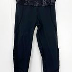 Lululemon Size 8 Black, Purple Crop Ruffle Ankle Trim Leggings with Zip Pocket Photo 0