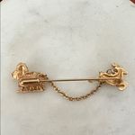 Vintage 1983 Avon Gold Reindeer and Sleigh Brooch Photo 1