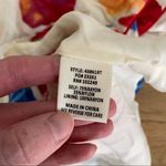 Skies Are Blue  - Floral Print Ruffle Short Sleeve Round Neck Peplum Top in White Photo 3