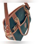 Dooney & Bourke Vintage Buckle Black/Tan Pebbled All Weather Leather purse Photo 2