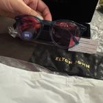 Elton John brand sunglasses with a price tag starting at $139. Blue Photo 3