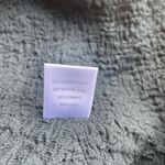 Torn By Ronny Kobo Ronny Kobo Zano Crop Top Small Puff Sleeve Wrap Around Tie Waist Black Revolve Photo 5