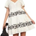 Ivory Short Sleeve V Photo 1