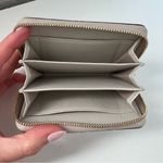 MCM NWOT  Embroidered Monogram Leather Zip Around Wallet in Oatmeal Cream Photo 6