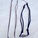 Set of Two Silver Tone Feather Cord Necklaces Photo 0