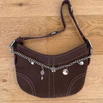 White Fox Boutique  - Caroline Faux Suede Charm Shoulder Bag in Brown & Silver Photo 0