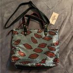 Juicy Couture Silver and Red Shoulder Bag with Elegant Design Photo 1