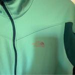 The North Face Women's Aqua and Dark Green Ski Jacket Photo 1
