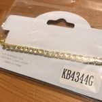 GOLD TONE CLEAR RHINESTONE STRETCH BRACELET Photo 1