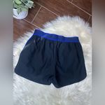 Under Armour black/royal blue athletic shorts sz XS Photo 2