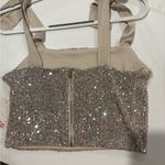 SO  Silver Sequin Top in Junior size Large. Photo 4