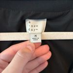 A New Day  Black Vest Photo 1