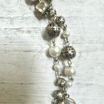 Silver tone faux pearl and rhinestone necklace Photo 7