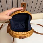 Round Woven Tan Crossbody Bag Photo 1