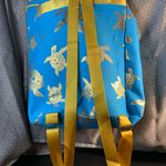 Blue and Gold Turtle Print Backpack Novelty Jewel Bahamas with front pockets Photo 1